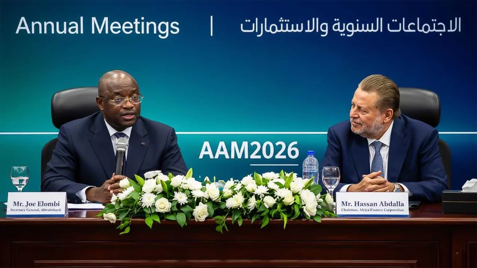 Afreximbank Secretary General Joe Elombi speaking on a panel beside Africa Finance Corporation Chairman Hassan Abdalla at an AAM2026 event