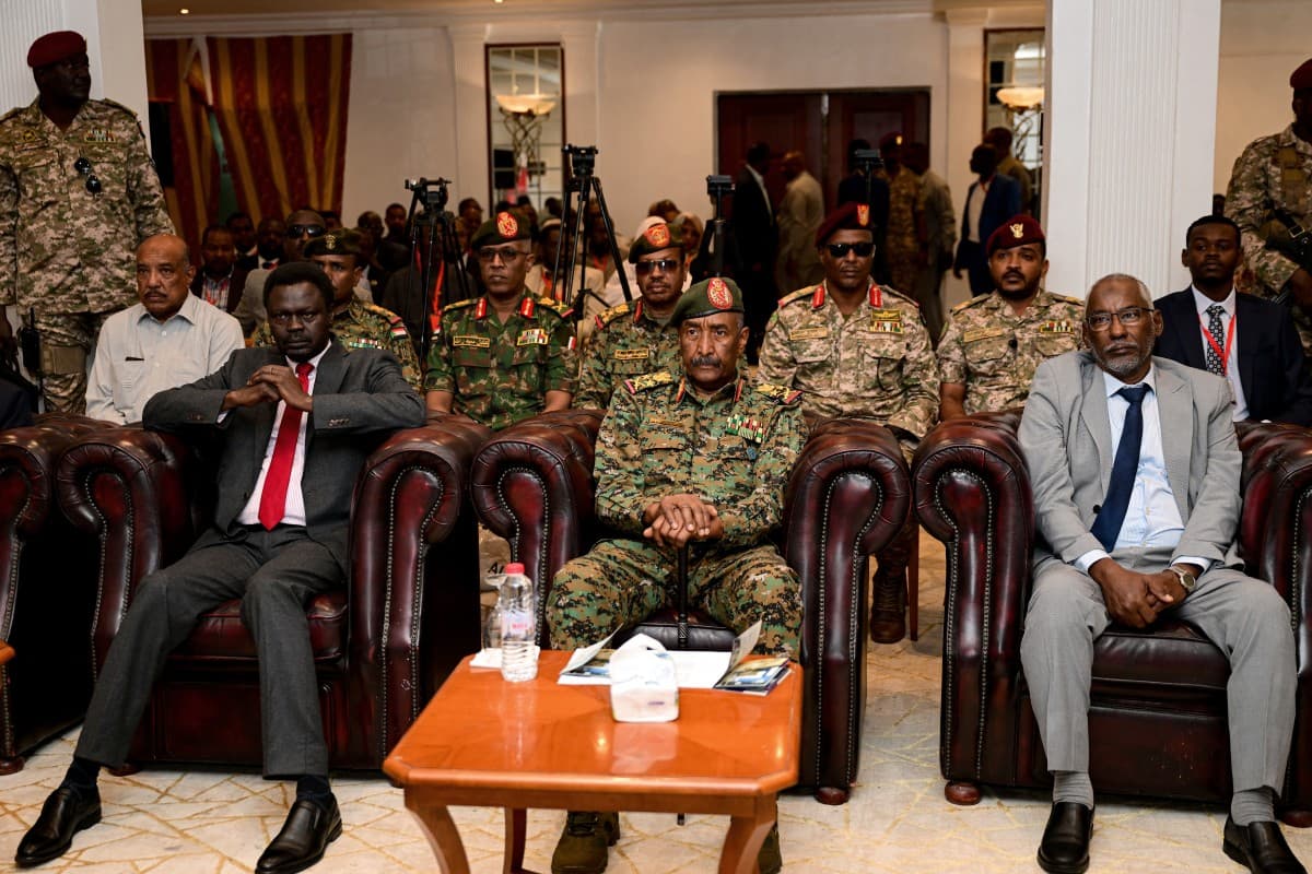 Sudanese military and government officials seated together during a formal meeting